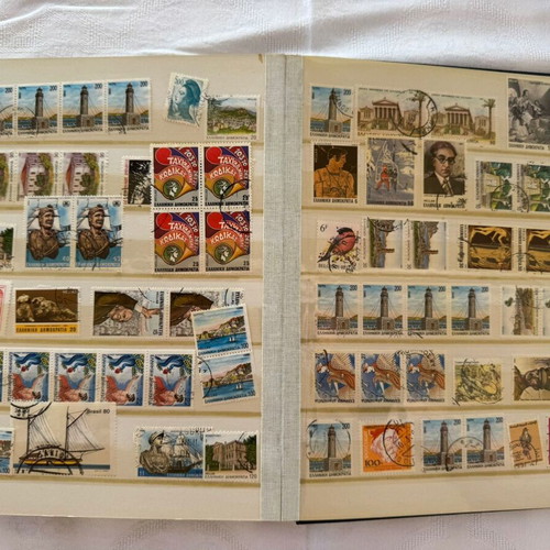 Stamp album collection about 615 stamps like new