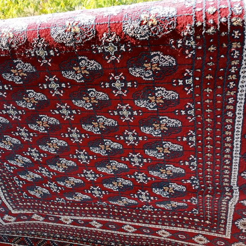 Wool rug like new, size 1.37x2.25 m, red color