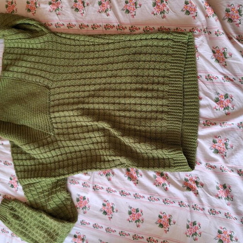 Green pullover with checkered pattern and unique neckline like new