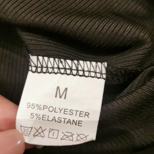 Black top with white strap size M like new