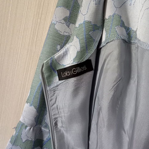 Lola cocktail dress like new, midi green with silver patterns