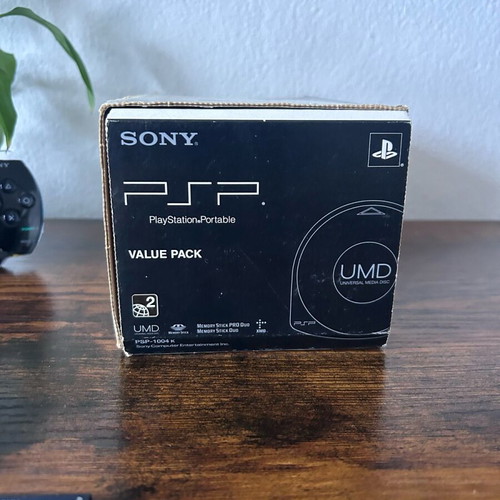 Sony PlayStation Portable PSP-1004 used with original box and accessories