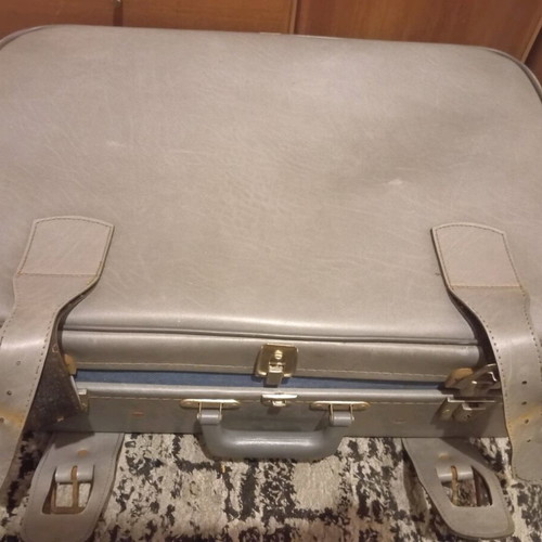 Large suitcase used gray