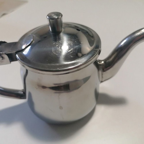 Inox set with 2 egg holders and teapot used