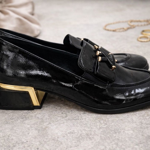 Women's black patent loafers with gold detail like new