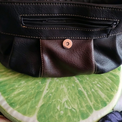 Charm and Shape shoulder bag like new, leather with tassels