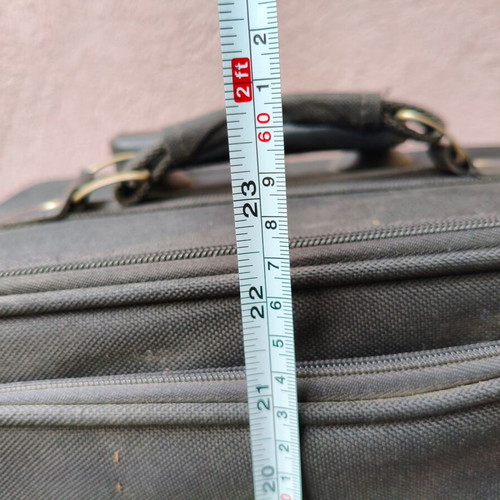 Wheeled suitcase used black