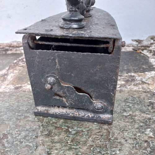 Karavaki Charcoal Iron used with ornate handle design