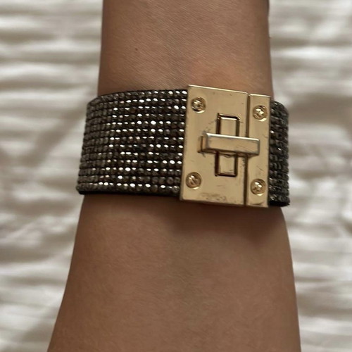 Bracelet with rhinestones used, black and silver with gold clasp
