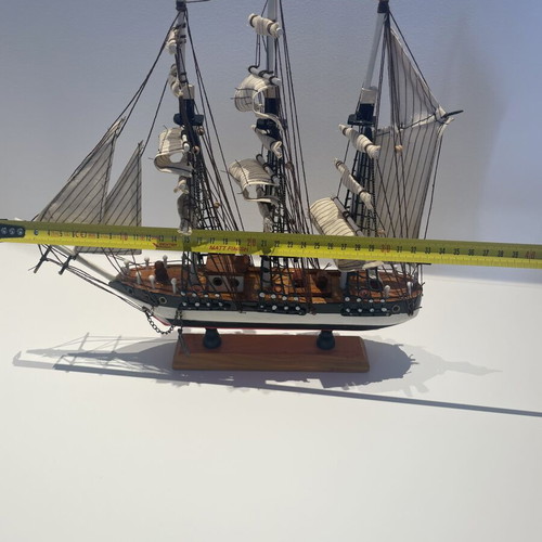 Vintage wooden decorative ship like new with striped sails and wooden base