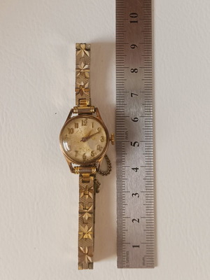 Vintage Swiss Made women's watch, gold plated with safety chain, 20 MC