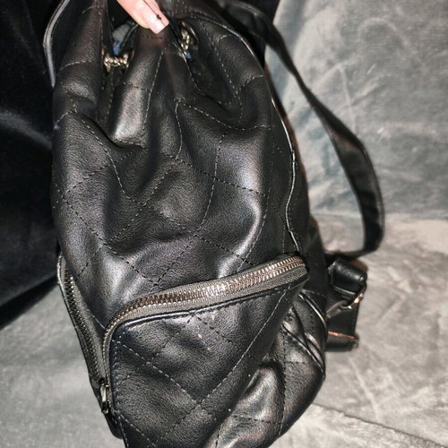 Backpack used, black with multiple pockets