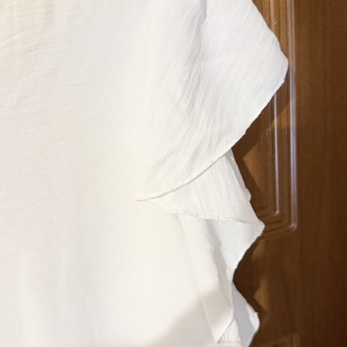 White airy blouse with V neckline and ruffle sleeves, like new, size L/XL