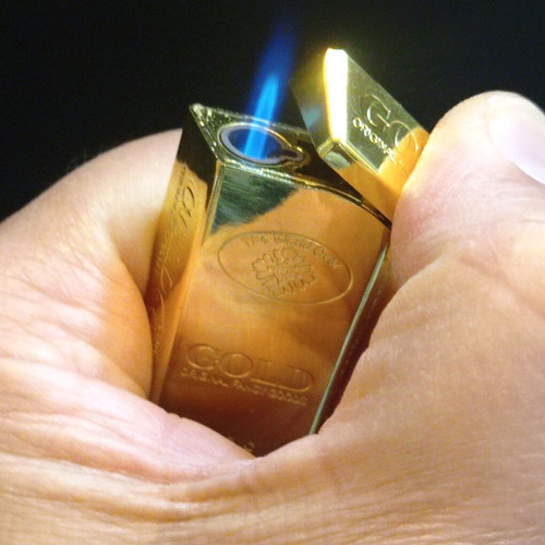 Gas lighter new, shaped like a small gold bar