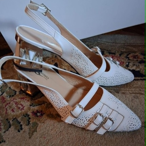 Elegant white slingback shoes like new with perforation and stylish heel