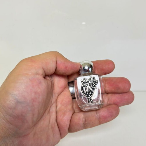 Vintage glass perfume bottle with metal tulip decoration