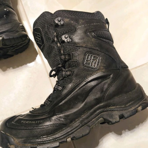 Columbia men's black boot used with silver details