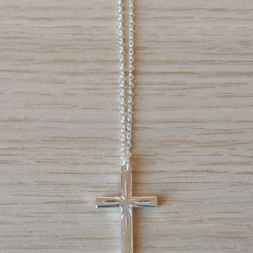 Steel cross like new, silver color
