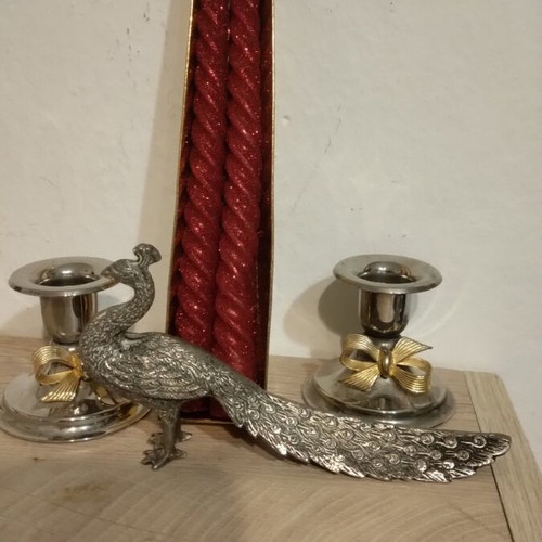 Silver-plated candlesticks with candles and peacock figurine like new