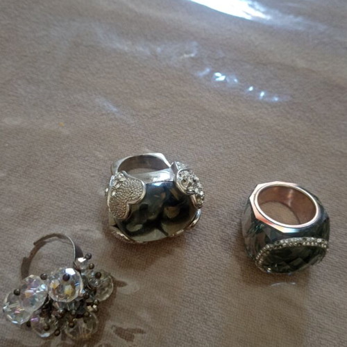 Set of 3 bulky rings used, size 18.5, missing some stones