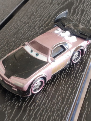 Disney Cars Boost 1:55 scale used with glued spoiler and bent wheels