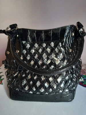 Women's black patent leather handbag with silver woven design like new