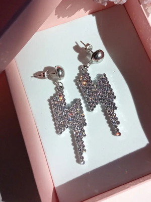 Stud earrings lightning bolts with rhinestones, new, silver color