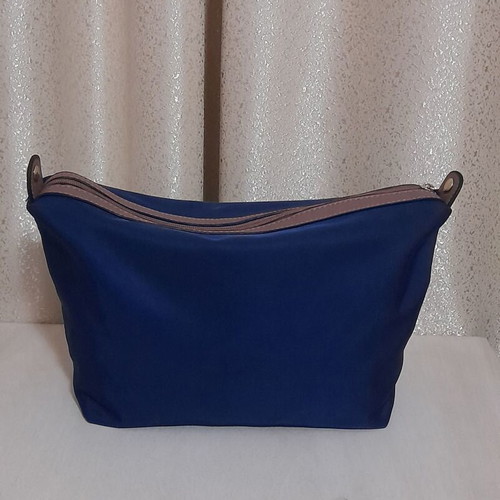 Axel toiletry bag navy blue with brown details