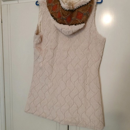Fur vest used, pale pink with ethnic details, size L
