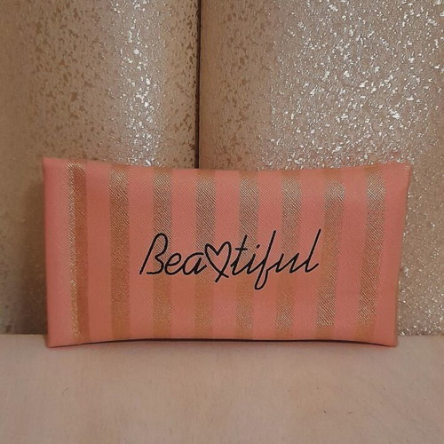 Beautiful glasses case new, pink with gold stripes