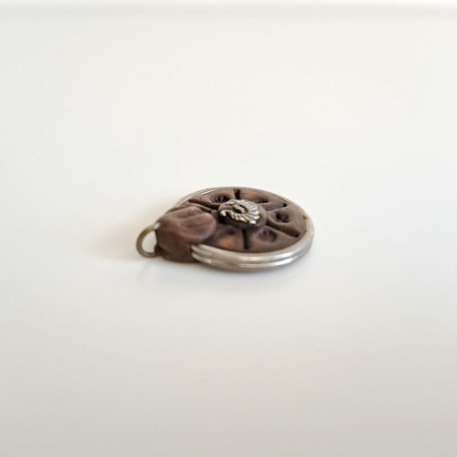 Vintage handmade leather and metal pendant with sculpted scorpion