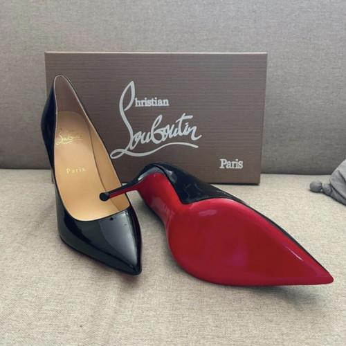 Christian Louboutin black patent leather pumps used