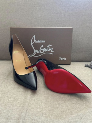 Christian Louboutin black patent leather pumps used