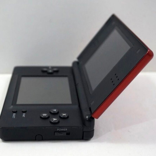 Nintendo DS Lite console used with Pokemon LeafGreen cartridge and accessories