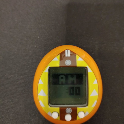 Tamagotchi Demon Slayer Zenitsu like new