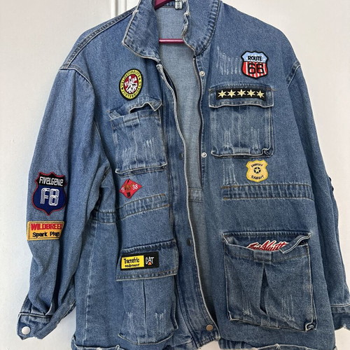 Women's oversized denim jacket with colorful patches