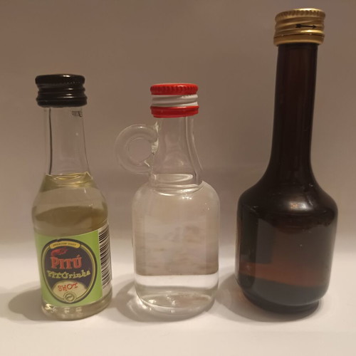 Miniature liqueur bottles, pack of 7, assorted origins