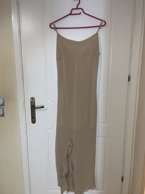 Nude dress used with lining and small stain