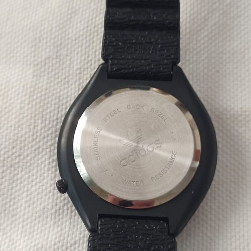 Adidas watch like new with original day and month indicator
