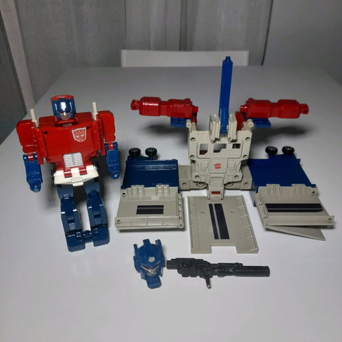 Optimus Prime used toy with missing parts