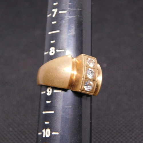 Brass ring with 3 zircon stones