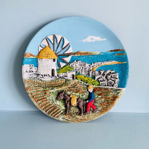 Embossed handmade decorative wall plate used with Paros motif
