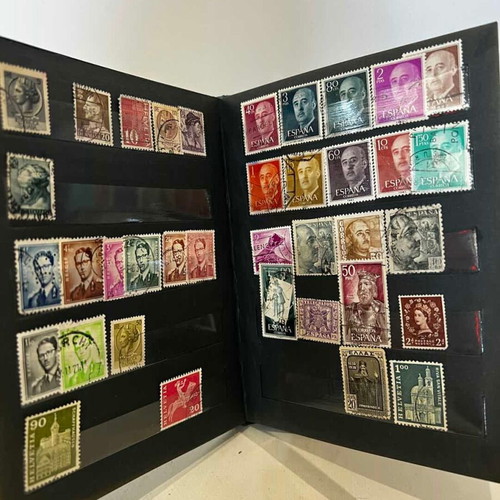 Stamp album with various collectible stamps used, 19x14.5 cm