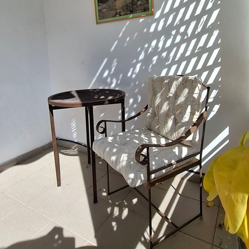 Retro wrought iron garden armchair with cushions used
