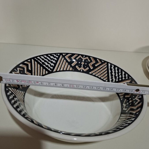 Vintage dinnerware set of 7 pieces with geometric black and brown pattern, like new