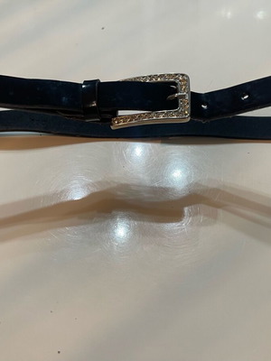 Black thin belt with silver rhinestone buckle used