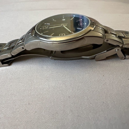 Candino Swiss watch titanium with blue dial and silver bracelet like new