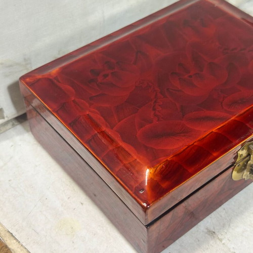 Vintage wooden jewelry box used with red satin lining