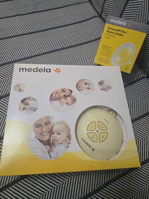 Medela Swing breast pump with extra breast shields