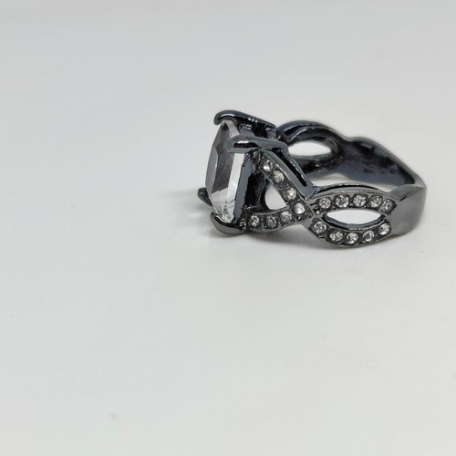 Black ring with large emerald cut crystal, like new